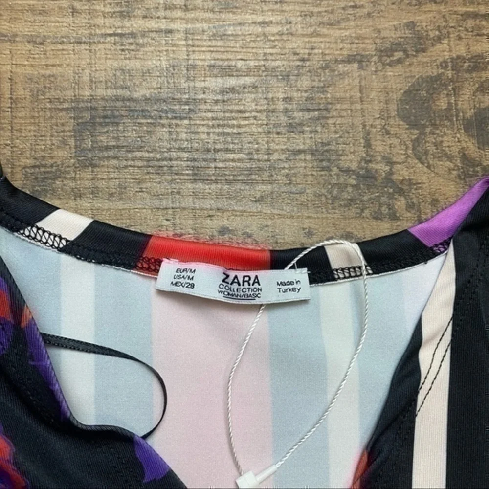Zara bodysuit with striped & floral print medium womens Zara bodysuit medium